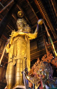 26.5 meter statue of Migjid Janraisig inside the temple.