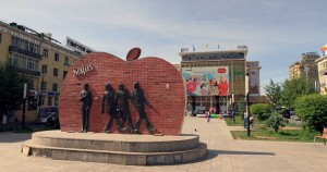 Beatles monument in Ulaanbaatar; the State Department store is in the background.