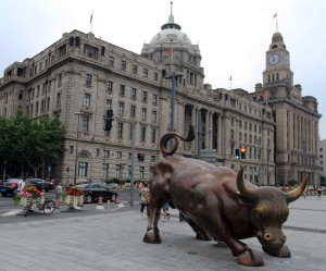 The 'Bund Bull' in front of the old government building in Shanghai - designed by the same sculptor who created the 'Wall Street Charging Bull'.