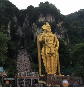 Steps leading up to Batu Caves and Lord Murugan to the right.