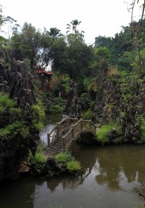 Pond garden with miniature bridge in Sam Poh Tong.