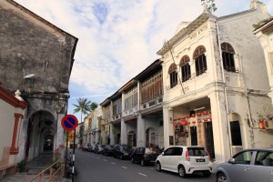 Street lined with historic homes and shops in George Town.