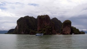 Khao Phing Kan Island in the foreground with a much larger island behind it.