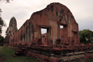 The sermon hall with principle prang in the background in Wat Ratchaburana.