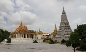 The Temple of the Emerald Buddha with a large stupa in the foreground.