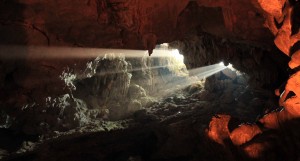 Sunlight shining through inside Thien Cung Grotto.