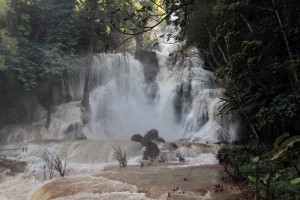 The main waterfall at Kuang Si Waterfalls, seen from the other side of the stream.