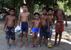 Children stopping their football game to pose for a picture (I didn't ask, they just did).