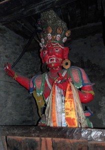 A protector deity near the entrance inside the Braga Gompa.