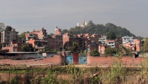 Swayambhunath on the hill in the distance.