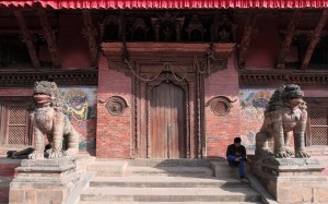 Doorway flanked by Buddha eyes.