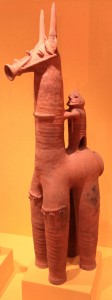 Votive equestrian figure - with a mouth like Birdo from Super Mario Brothers 2.