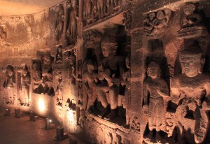 Sculptures along the wall inside Cave No. 26.