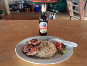My dinner of Swahili spicy rice with chicken and a Kilimanjaro beer.