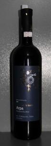 Bottle of Armenian semi-dry red wine, crafted from Areni Noir and Tozot grapes.