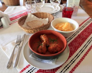 Traditional Romanian red sauce chicken stew.