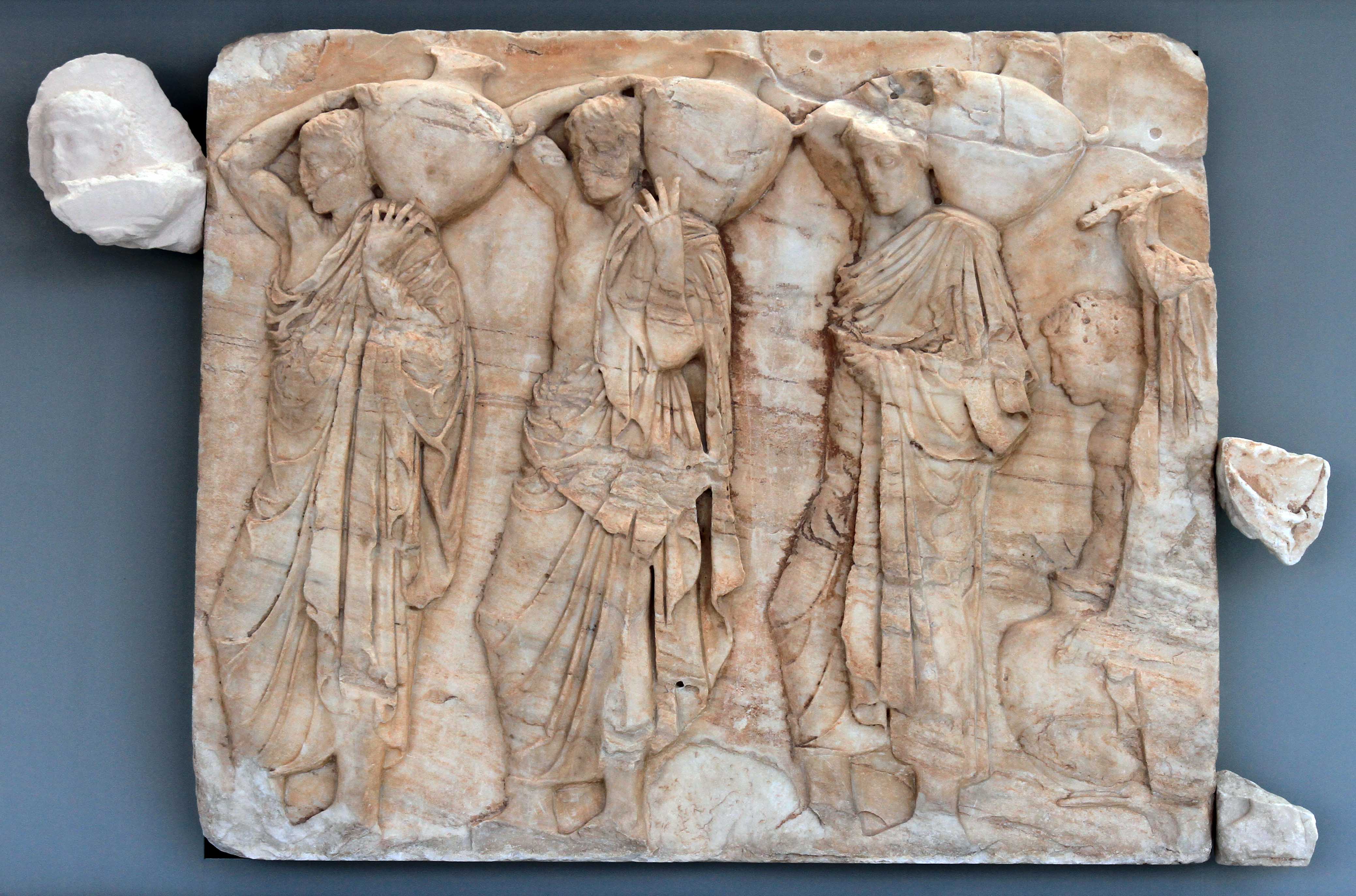 Block depicting the procession of four hydria-bearers (from the Parthenon's frieze).