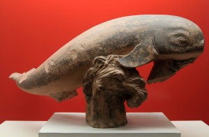 Terracotta dolphin bounding over the waves (from the 5th-century BC).