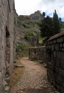Trail through the ruins along the wall, leading up to the Castle of St. John.