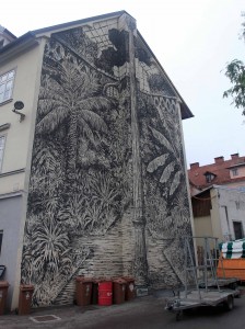 Artwork on the side of a building next to the central market in Ljubljana.