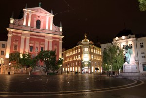 Prešeren Square and the Franciscan Church at night.