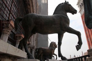 The replica Horses of Saint Mark on the loggia above the porch, of St. Mark's Basilica.