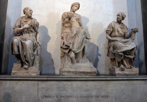 Statues of St. Cosmas, Madonna and Child, and St. Damian inside the Sagrestia Nuova ('Madonna and Child' was sculpted by Michelangelo).