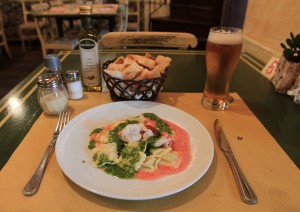 Beer, bread, and fish ravioli with shrimps and arugula’s pesto - part of my last dinner in Italy.