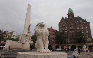 One of two lion sculptures on the National Monument (a World War II monument) on Dam Square.