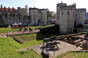 The Byward Tower and Middle Tower (with the remains of the Lion Tower drawbridge pit in the foreground), on the west side of the Tower of London.