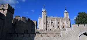 View of the White Tower from outside the Tower of London fortress, near the Thames River.