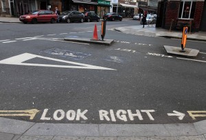 All pedestrian crosswalks in London have reminders painted on the road telling tourists (presumably) which way they should be looking for oncoming traffic - they should really just drive on the right like the majority of the modern world.