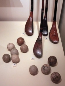 Golf balls made of leather and stuffed with feathers, as well as four clubs (from the first half of the 19th-century AD).