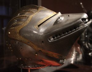Armored helmet shaped like the head of a beast.