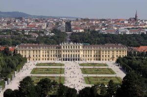 Schönbrunn Palace seen from the Gloriette; Austria's beloved Maria Theresa received the palace as a wedding gift for her marriage to the Holy Roman Emperor Francis I.
