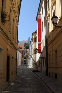 Prepoštská street with Bratislava Castle visible in the background.