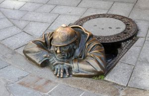 'Čumil' (translated as "the watcher") - this probably Bratislava's most famous statue -, found at the junction of Laurinská and Panská streets.