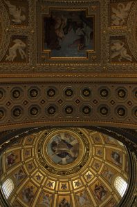 The highly decorated ceiling and dome inside St. Stephen's Basilica.