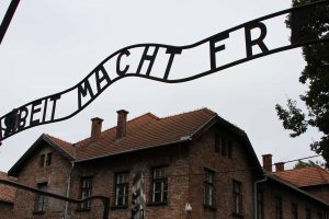 The infamous "Arbeit macht frei" sign over the entrance to the Auschwitz I concentration camp - this is a replica since the original was stolen the year before.